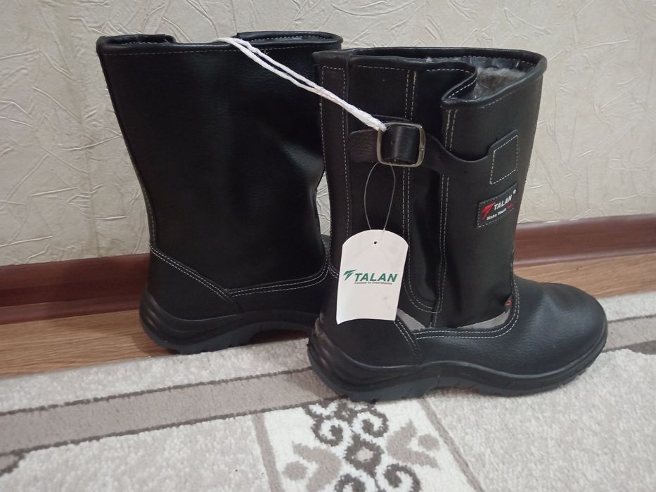 Продам новый сапоги