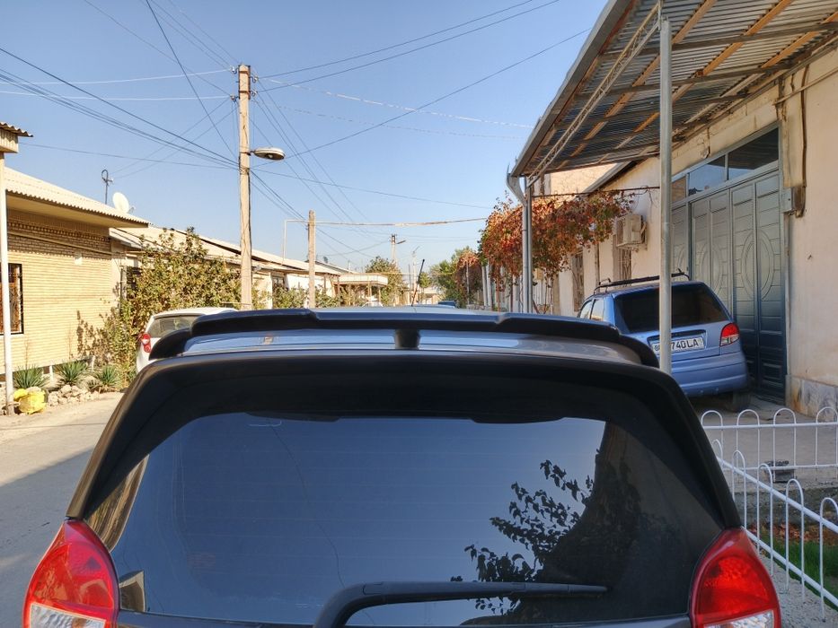 Спойлер Спарк 100 000