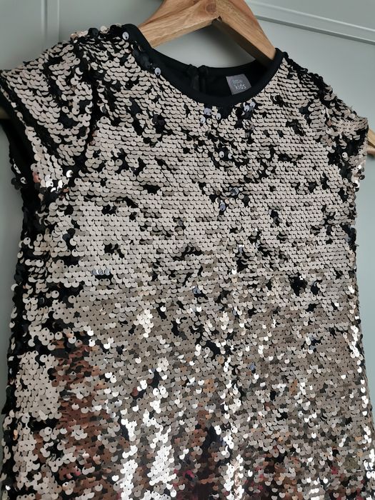 Rochita cu paiete reversibile, marime 110 (4-5 ani) 
Marime 11