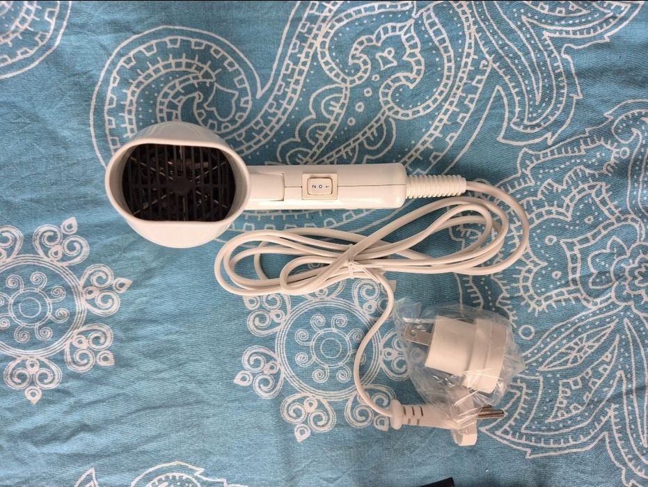 Vand uscator de par Rowenta de calatorie