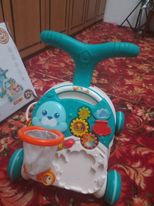 Игрушка каталка для маленьких