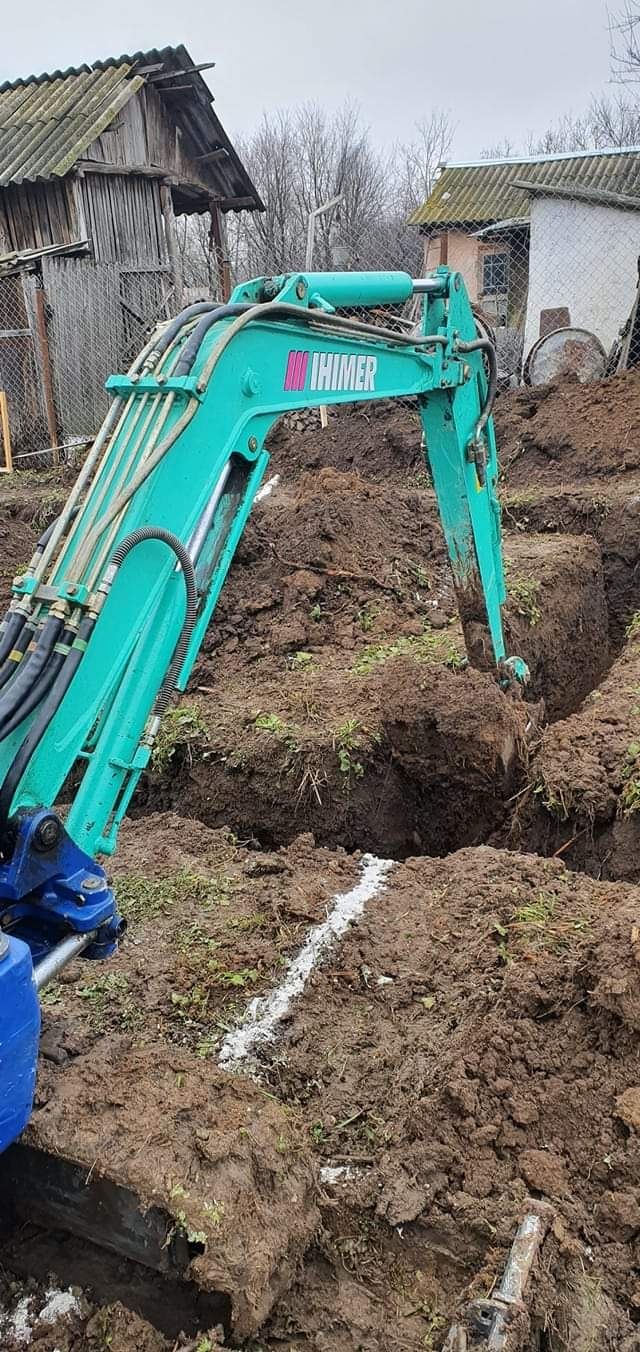 Miniexcavator Basculantă