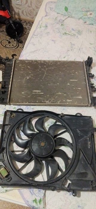 Продам радиатор охлаждения двигателя на кобальт и вентилятор охлаждени