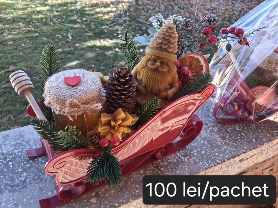 Aranjamente cu miere de albine și lumânări decorative din ceară