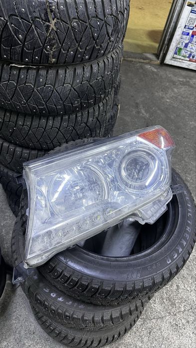 Фара крузак 200 левая сторона