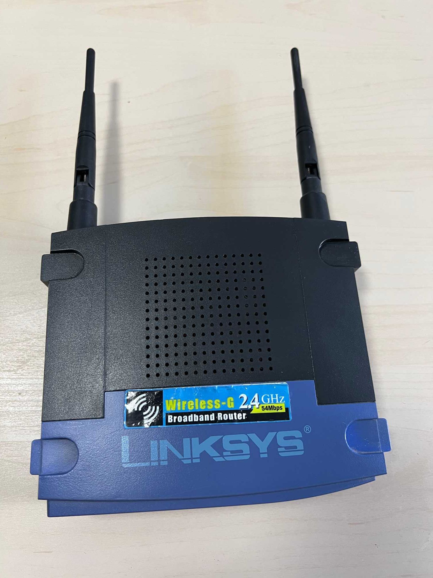 Vand router wireless Linksys RT54GL + cablu de retea+CD instalare
