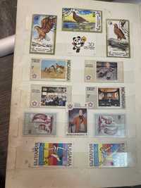 Vand album de timbre cu timbre de colectie din diferite tari