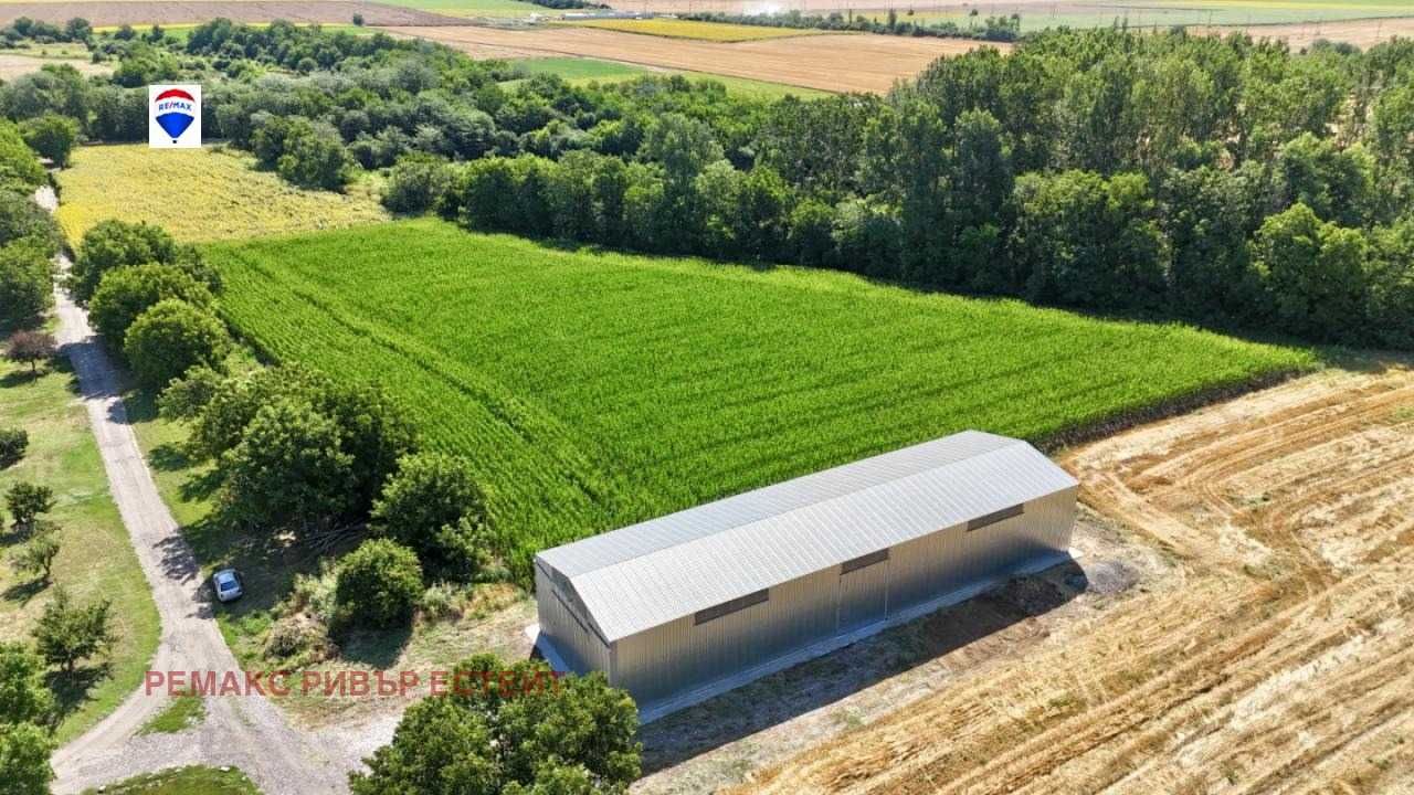 Склад с прилежаща земя за продажба с. Сандрово, обл. Русе