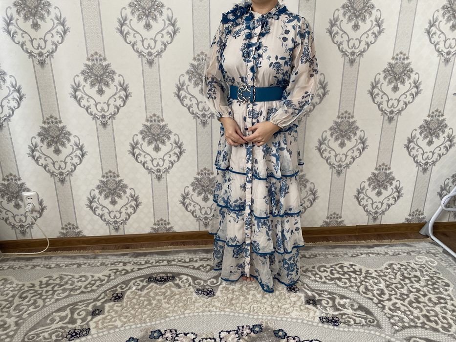 Платья женщин