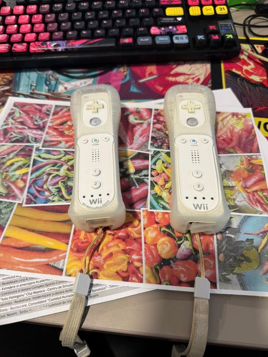 Consola Nintento Wii + 2 telecomenzi + 2 volane + 2 nunchuks si joc ca