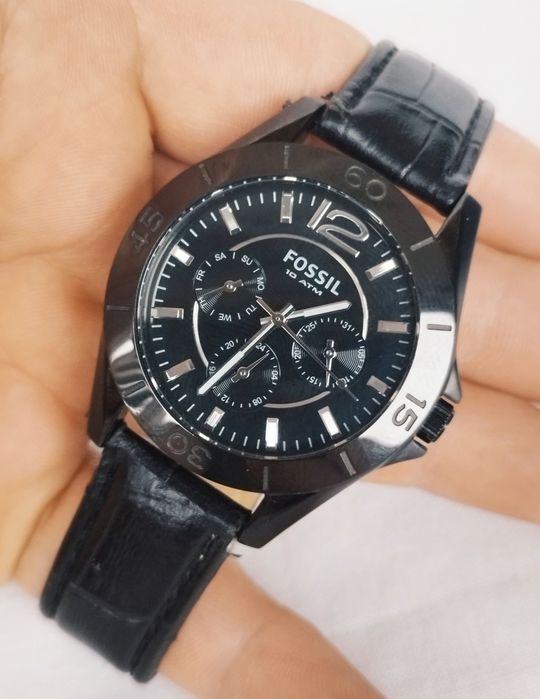 Ceas bărbătesc Fossil CE1003 ceramic, cu quartz si curea din piele.