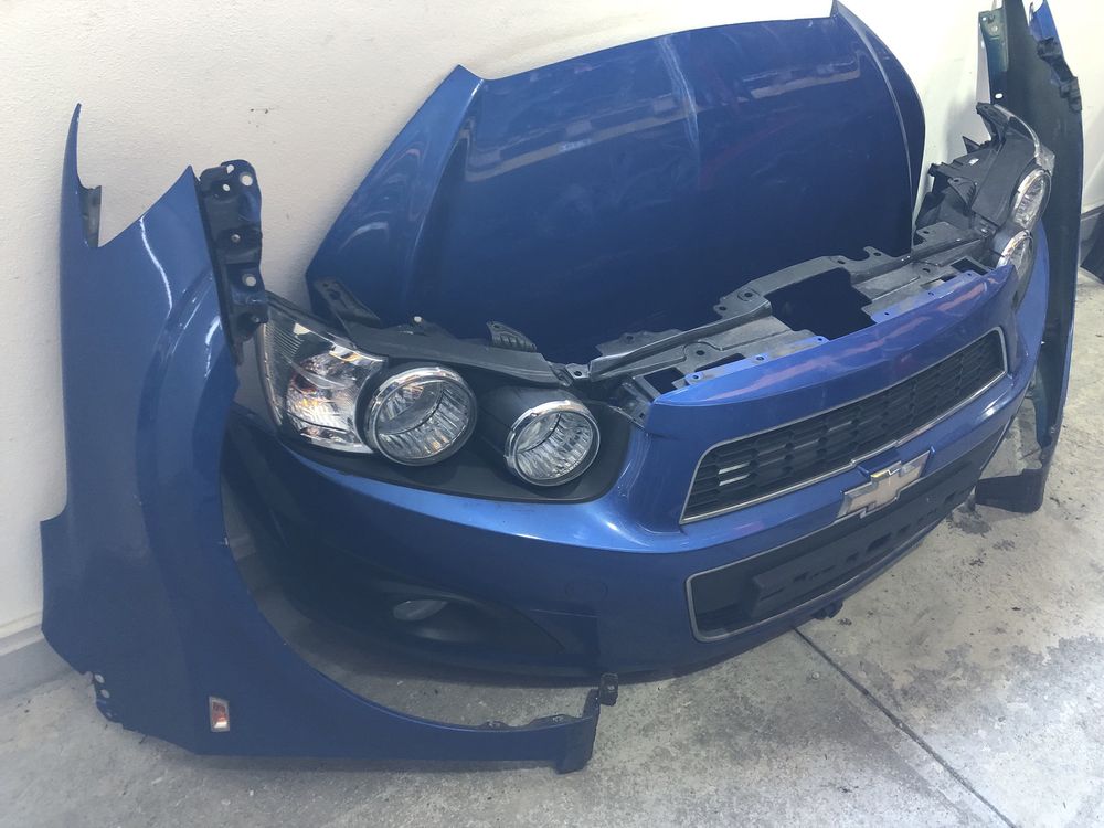 Fata completa Chevrolet Aveo t300 2012-2017 bara capota far aripa