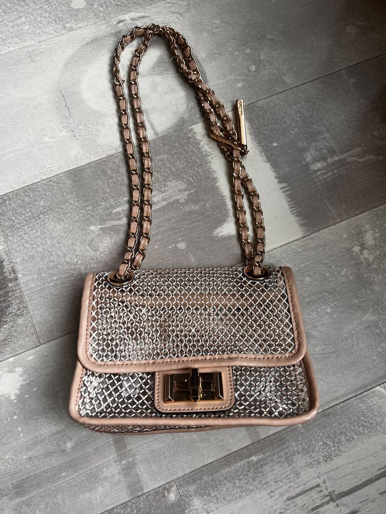 Дамски чанти на  DKNY Guess, Aldo , USPA