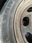 Jante de tabla BMW 5x120 R16 cu cauciucuri de iarna uzate Michelin