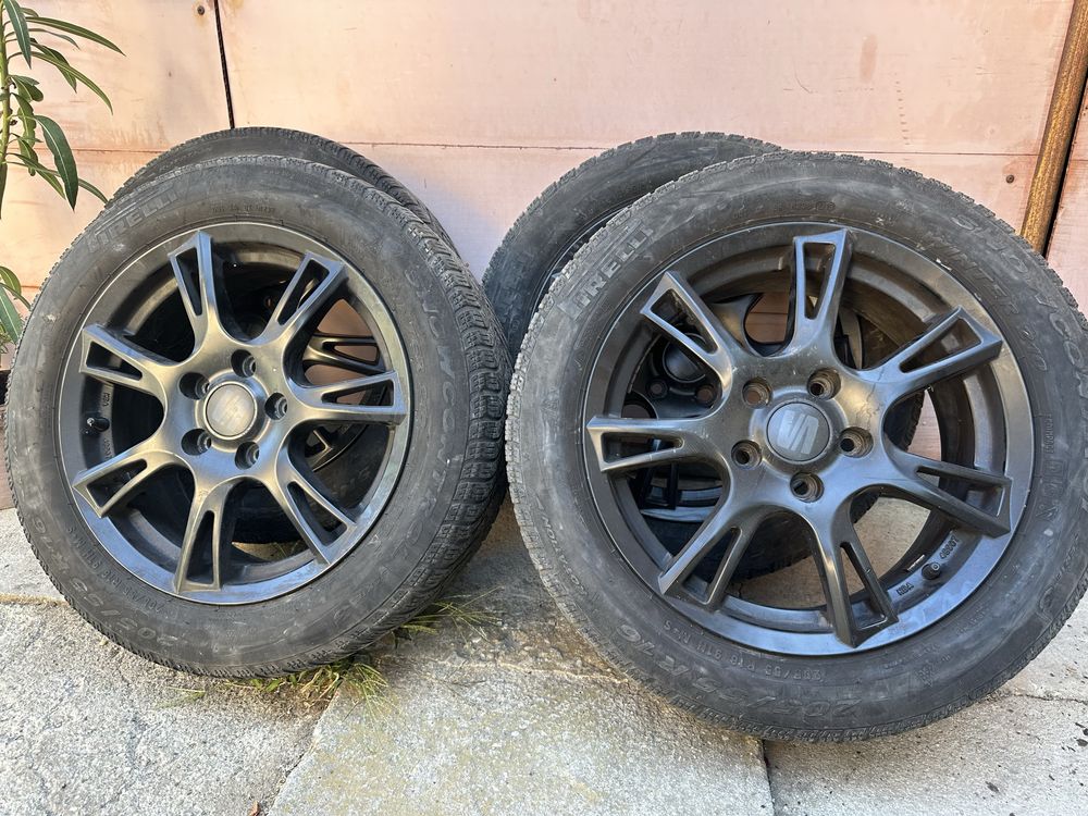 Set 4 jante aluminiu + anvelope de iarnă Pirelli 205/55 R 16 Seat Leon