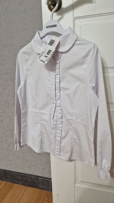 Продам новую школьную рубашку для девочки 122 см