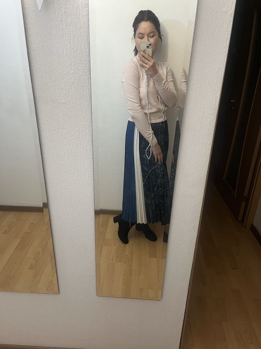 Юбка длини миди