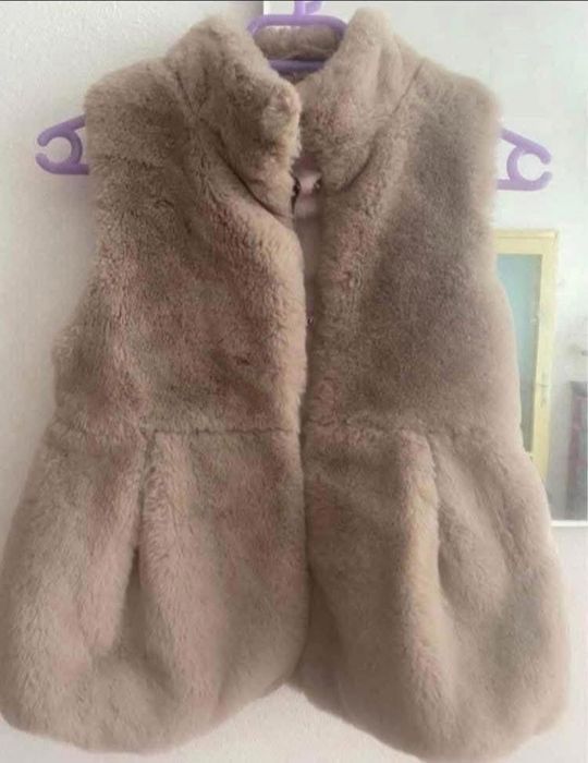 Пухкав красив елек майорал