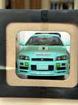 Macheta 1:18 Nissan Skyline R34 Falken Solido, nu Autoart, Kyosho