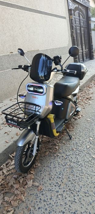 Скутер  электронный модель Ridek.