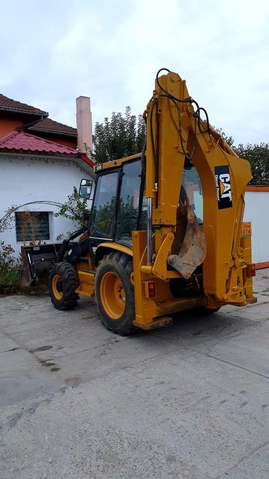 Buldoexcavator Caterpillar