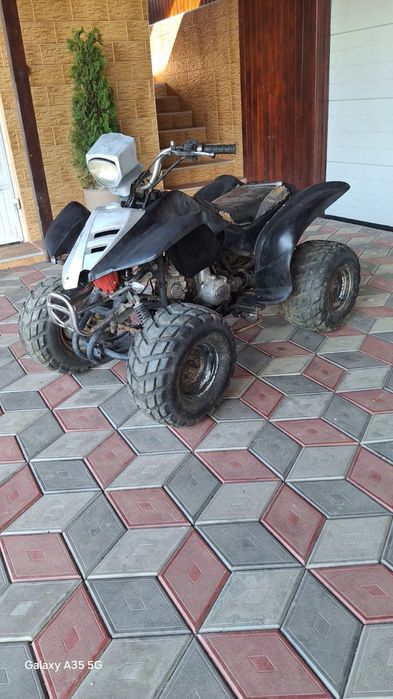 Vând atv 125  transmisie pe cardan necesita un capac preț 1800 euro