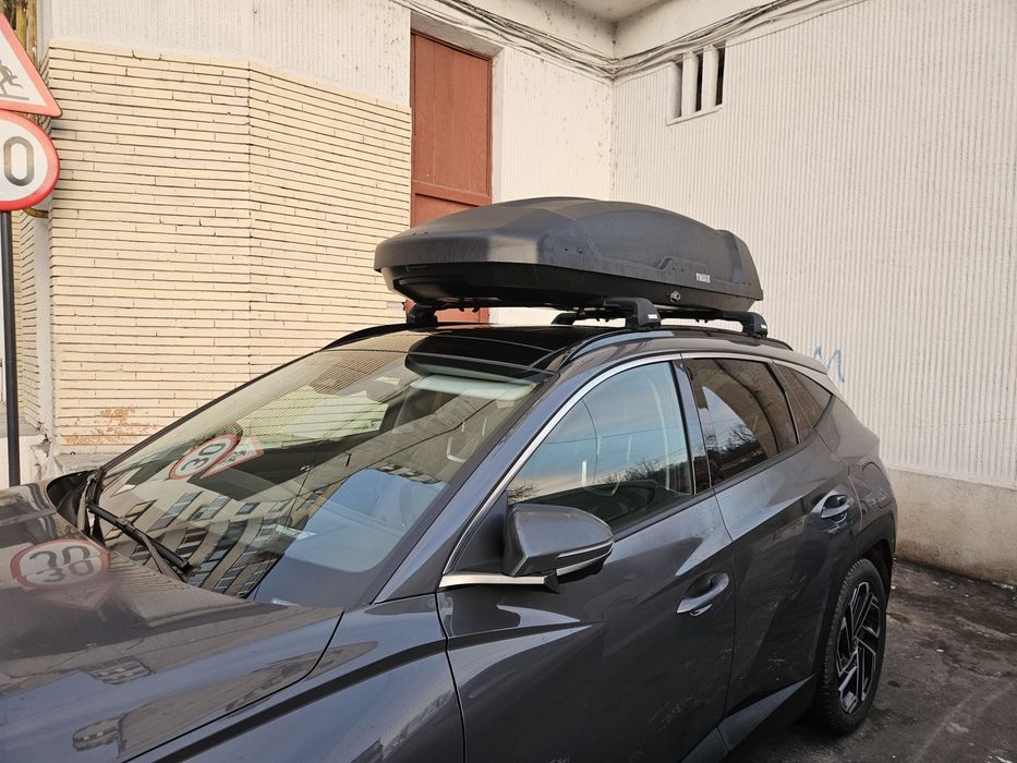 Cutie portbagaj auto Thule de inchiriat