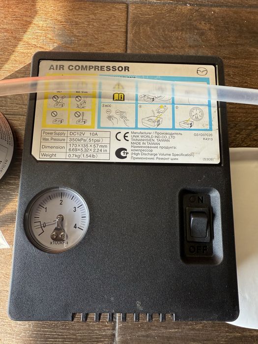 Авариен комплект компресор за гуми Mazda