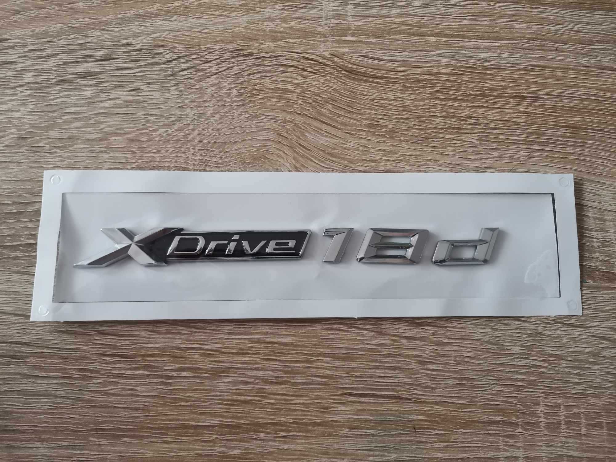 сребрист надпис BMW Xdrive 18d