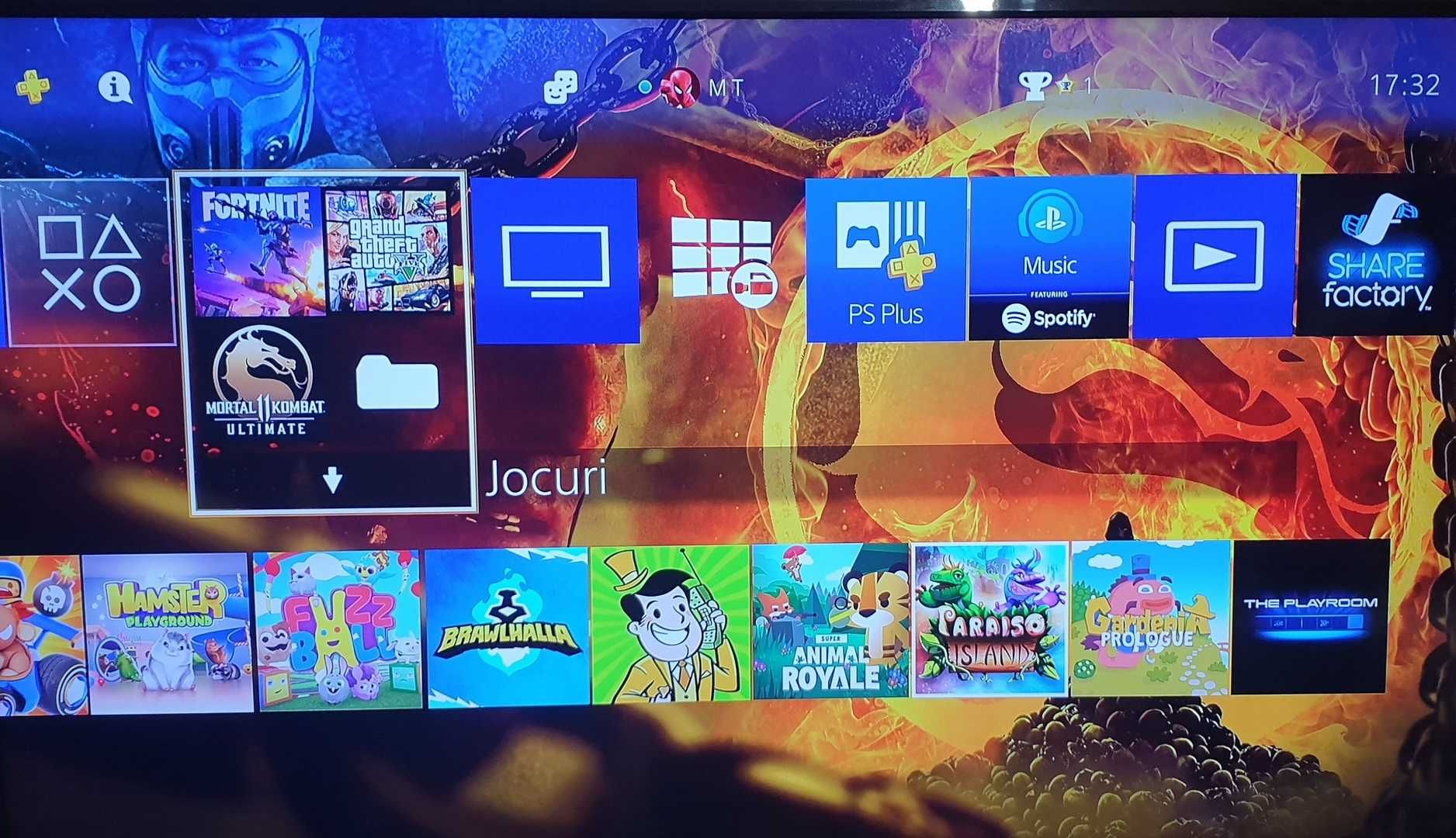 25 jocuri + PS4 SLIM cu GTA V, Fortnite, Mortal Kombat 11, 2 Manete
