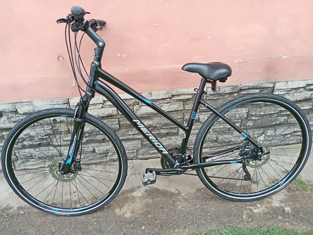 Bicicleta Merida roti pe 28 frâne disc hidraulice import Germania