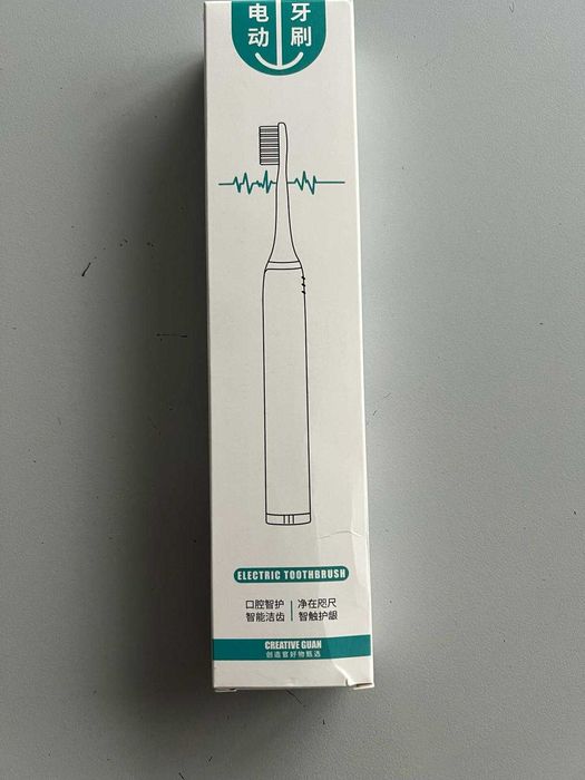 Periuta de dinti electrica baterii + 4 capete rezerva