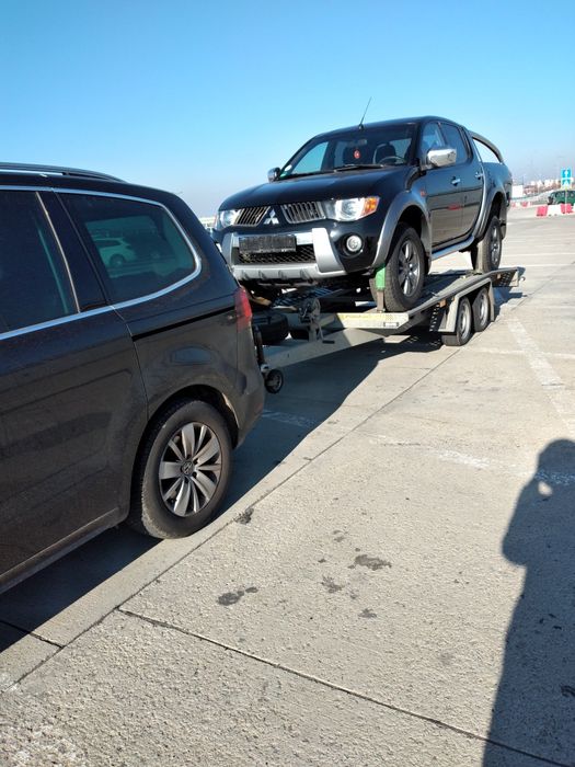 Tractari  auto cu platformă si 5 pers