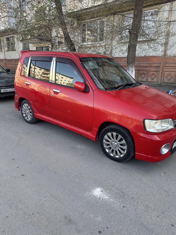 Автомобиль nissan cube