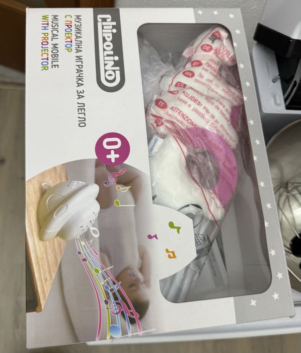 Музикална играчка за легло с проектор CHIPOLINO