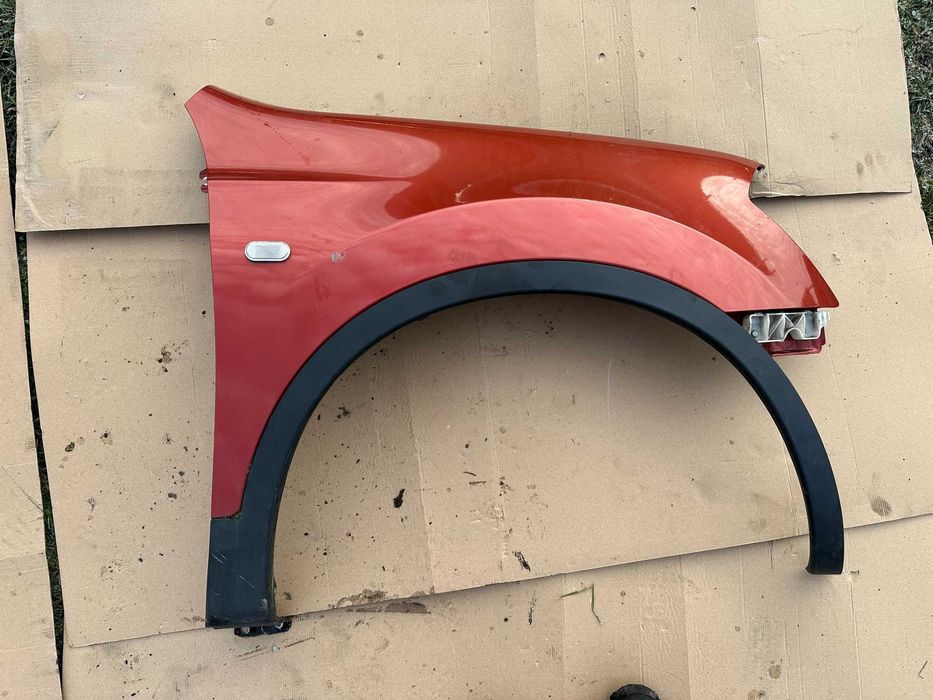 Aripa stanga / dreapta fata Nissan Qashqai culoare rosu