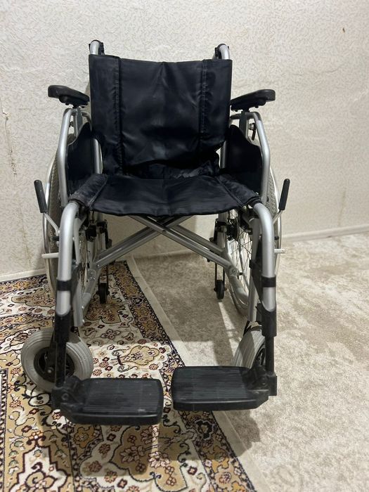 Инвалидная коляска