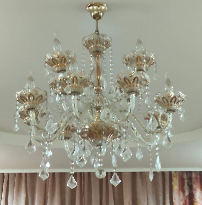 Продам новый хрустальная люстра цвет серебро