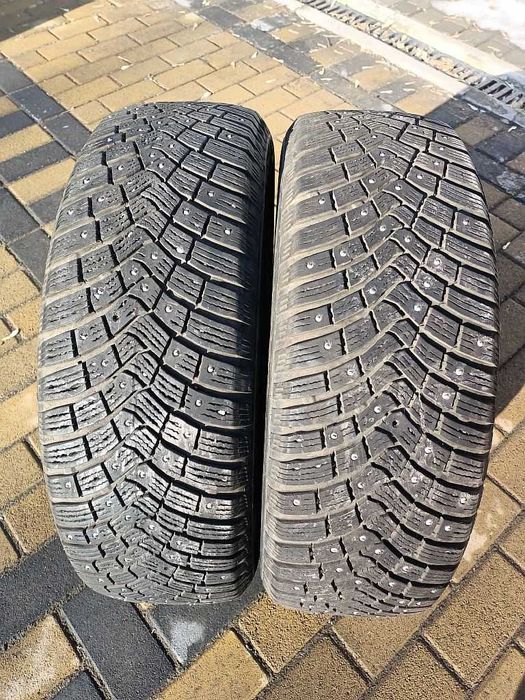 Две шины 195/65 R15 - "Continental IceContact 3" (Россия), шипованные.