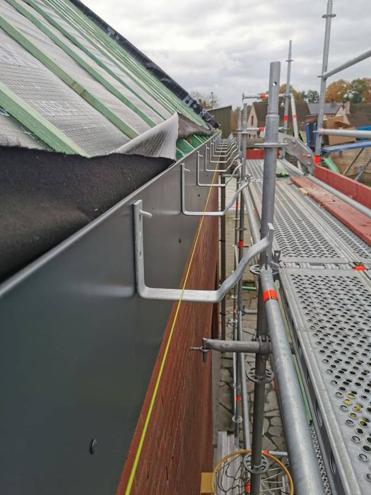 Executam lucrări de construcții Acoperișuri
