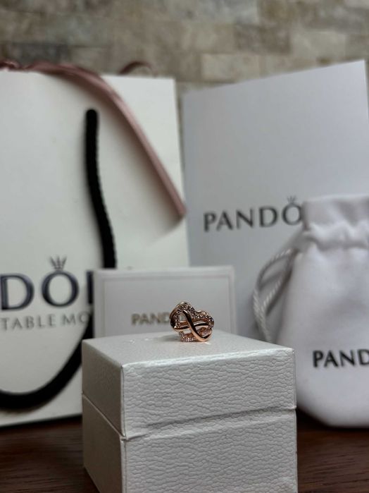 Пандора талисман Безкрайност - розово злато