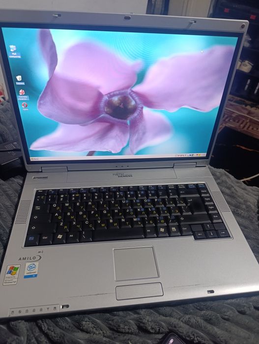 Продам старенький но рабочий ноутбук