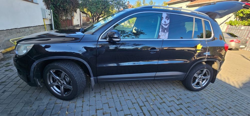 Vand vw tiguan  sau schimb cu camioneta basculabila