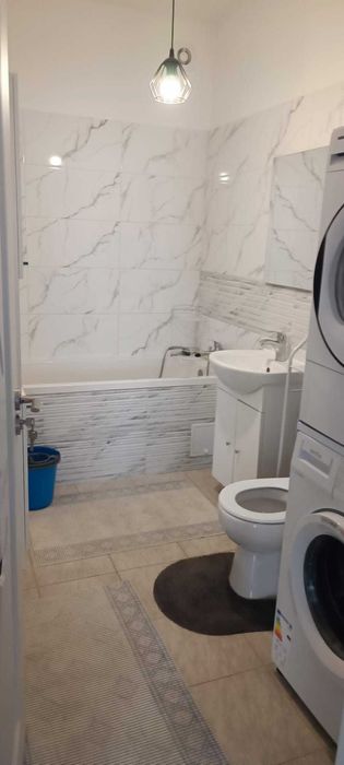 Inchiriez ap 2 camere mobilat/utilat complet,curte proprie-Sanpetru