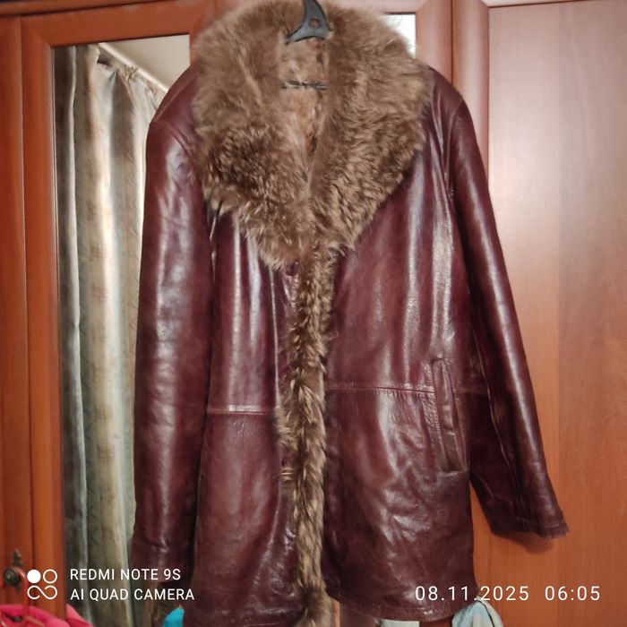 Дублёнка Б/У.Натур Енот.Ращмер 50.