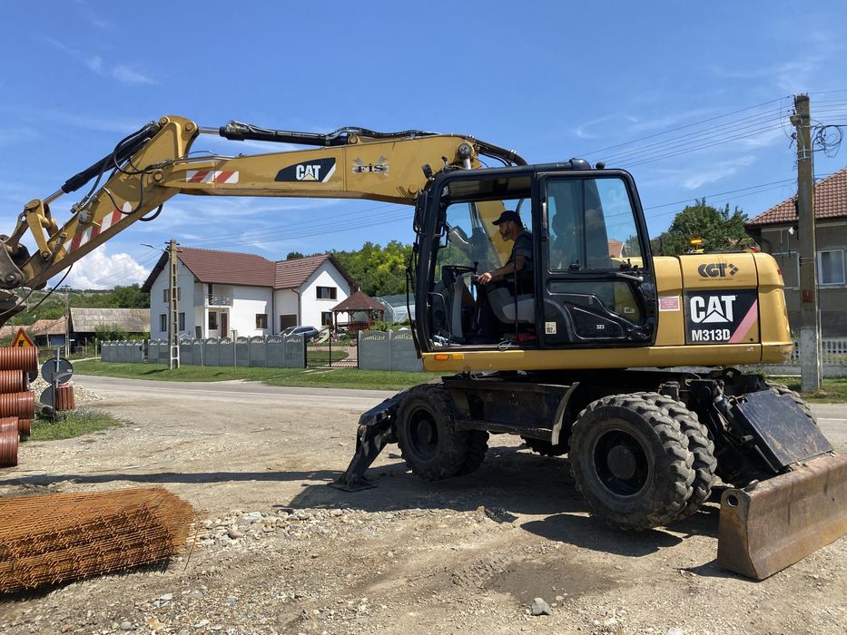 Excavator pneuri Cat 313 D