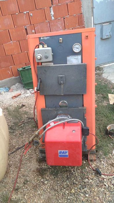 2 centrale  una pe ulei ars si pe lemne de 80 kw si wismman de 35kw