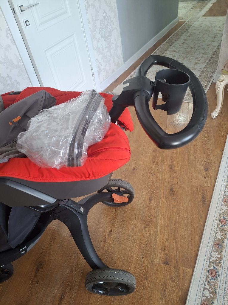 Stokke V6 коляска и люлька