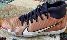 Юношески футболни обувки NIKE Mercurial Qatar TF