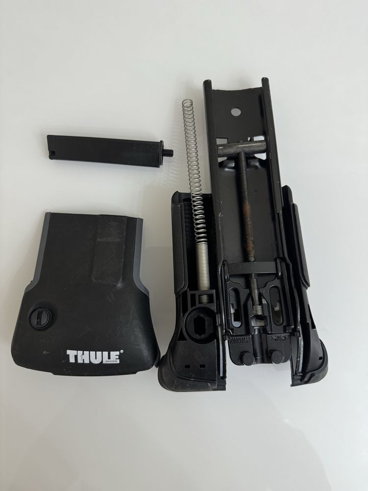 Крепежный механизм от поперечины Thule AeroBlade Edge